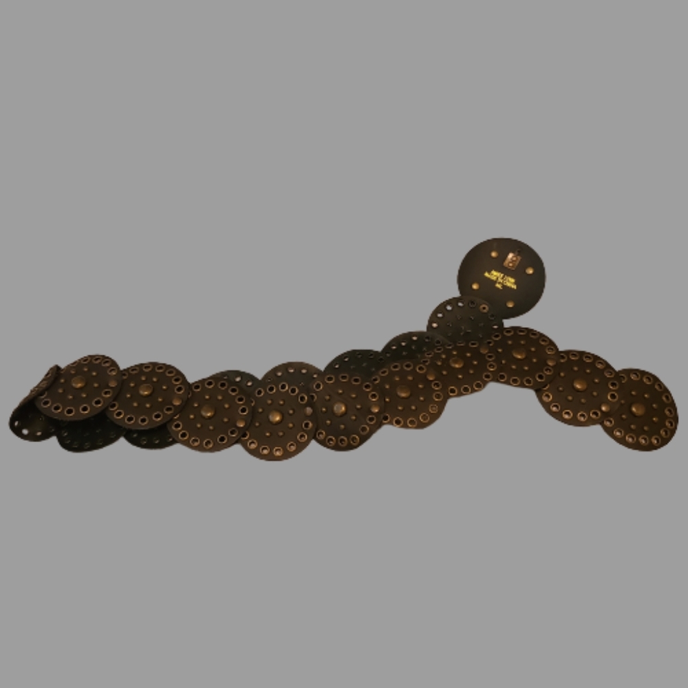 *Amiee Lynn Size Tooled Faux Leather Belt with brushed gold/brass grommets.
